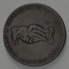 "Am I Not a Man and a Brother" token