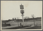 View at Canoe Place Inn. Shows sign, roadway, bridge. Hampton Bays,  Southampton