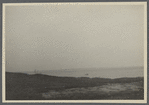 View of rock off shore. Gardiner's Island in distance. Fireplace, East Hampton
