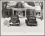 Every available space for parking is used by skiers on weekends at Clinton Gilbert's farm. The house is about 8 years old; purchased by Gilbert in 1929. He has about 150 acres, mainly a dairy farm with 23 cows. He also makes about 100 gallons of maple