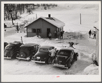 Every available space for parking is used by skiers on weekends at Clinton Gilbert's farm. The house is about 8 years old; purchased by Gilbert in 1929. He has about 150 acres, mainly a dairy farm with 23 cows. He also makes about 100 gallons of maple