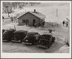 Every available space for parking is used by skiers on weekends at Clinton Gilbert's farm. The house is about 8 years old; purchased by Gilbert in 1929. He has about 150 acres, mainly a dairy farm with 23 cows. He also makes about 100 gallons of maple