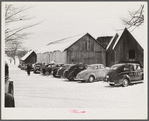 Every available space for parking is used by skiers on weekends at Clinton Gilbert's farm. The house is about 8 years old; purchased by Gilbert in 1929. He has about 150 acres, mainly a dairy farm with 23 cows. He also makes about 100 gallons of maple