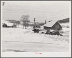 Every available space for parking is used by skiers on weekends at Clinton Gilbert's farm. The house is about 8 years old; purchased by Gilbert in 1929. He has about 150 acres, mainly a dairy farm with 23 cows. He also makes about 100 gallons of maple