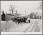 Horses hauling frozen truck to gas station. Woodstock, Vermont