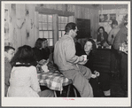Skiers in ski hut built by Clinton Gilbert, farmer in Woodstock, Vermont