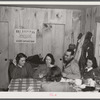 Weekend skiers, often from New York, can get warm and dry and refreshments in ski hut built by Clinton Gilbert, farmer in Woodstock, Vermont