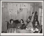 Weekend skiers, often from New York, can get warm and dry and refreshments in ski hut built by Clinton Gilbert, farmer in Woodstock, Vermont