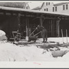 Sawing wood on farm. Woodstock, Vermont