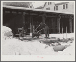 Sawing wood on farm. Woodstock, Vermont