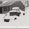 Truck snowed under on farm in Woodstock, Vermont