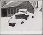 Truck snowed under on farm in Woodstock, Vermont