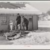 Hauling water in milk cans after pipes have frozen. Clinton Gilbert's farm, Woodstock, Vermont