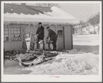 Hauling water in milk cans after pipes have frozen. Clinton Gilbert's farm, Woodstock, Vermont