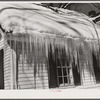 Icicles hanging from roof of house in Woodstock, Vermont