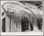 Icicles hanging from roof of house in Woodstock, Vermont