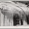 Icicles hanging from roof of house in Woodstock, Vermont