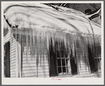 Icicles hanging from roof of house in Woodstock, Vermont