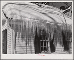 Icicles hanging from roof of house in Woodstock, Vermont