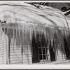 Icicles hanging from roof of house in Woodstock, Vermont