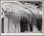 Icicles hanging from roof of house in Woodstock, Vermont