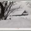 Highway and farm during snowstorm near Barnard. Windsor County, Vermont