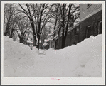 Woodstock, Vermont. Deepest snow in years piled up beside highways and sidewalks on main street