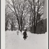 Deepest snow in years piled up beside highways and sidewalks on main street in Woodstock, Vermont