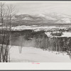 North Conway, New Hampshire, from Cranmore Mountain. Presidential range of White Mountains in distance. Skiers are taken up to the top by the skimobile. Eastern slopes ski territory. North Conway, New Hampshire
