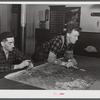 Farmers playing cards in pool room on winter morning. Woodstock, Vermont