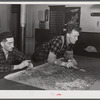 Farmers playing cards in pool room on winter morning. Woodstock, Vermont