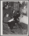 Skiers from Boston, Massachusetts, relaxing in lodge living room at North Conway, New Hampshire