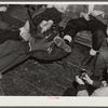 Skiers relaxing in lodge living room at North Conway, New Hampshire