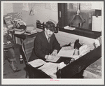 Baggage room agent in railway station. Mount Whittier, New Hampshire