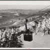 Cable car carrying skiers up Cannon Mountain. Franconia Notch, New Hampshire