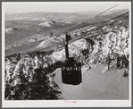 Cable car carrying skiers up Cannon Mountain. Franconia Notch, New Hampshire