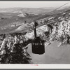 Cable car carrying skiers up Cannon Mountain. Franconia Notch, New Hampshire