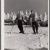 Skiers on top of Cannon Mountain. Franconia Notch, New Hampshire