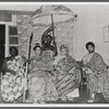 Portrait of civil rights worker Queen Mother Moore with unidentified individuals