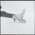 Woman modeling shoes
