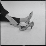 Woman modeling shoes