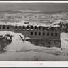 Old mill dynamited to avoid taxes after it was shut down about 1930. Berlin, New Hampshire, paper mill town inhabited largely by French-Canadians and Scandinavians