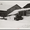 Farmhouse and milk cans near Saint Johnsbury, Vermont