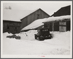 Farmhouse and milk cans near Saint Johnsbury, Vermont