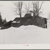 Sugar house on Walter Gaylord's farm. Mad River Valley, Vermont. Making syrup on King evaporator. He averages about 150 gallons of syrup annually this year tapped only 600 out of his 1000 trees because of unusually deep snow and late spring. He owns