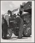 Farmers repairing tractor at community service center. Faulkner County, Centerville, Arkansas (see general caption)