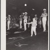 Street parade at night during cotton carnival ball. Memphis, Tennessee