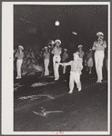 Street parade at night during cotton carnival ball. Memphis, Tennessee