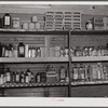 Medicine and drug shelf in country store which has doctor's office in rear. Faulkner County, Arkansas