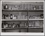 Medicine and drug shelf in country store which has doctor's office in rear. Faulkner County, Arkansas